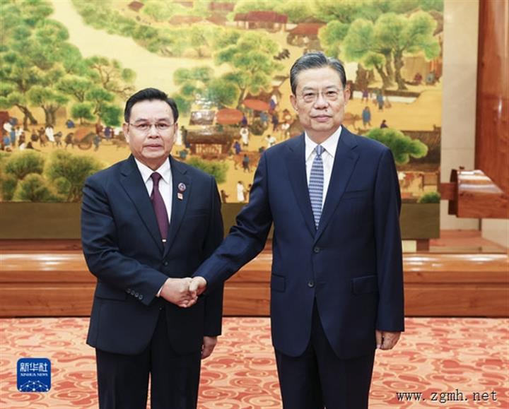 赵乐际同老挝国会主席赛宋蓬举行会谈