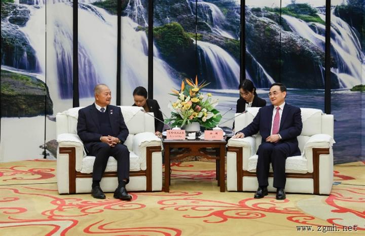 徐麟会见老挝人民革命党代表团一行