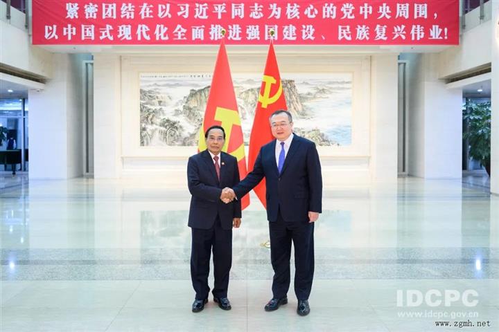 刘建超会见老挝人民革命党代表团